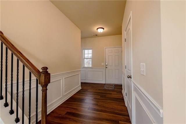 foyer entrance featuring dark hardwood / wood-style flooring