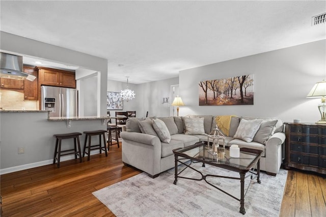 3408 Lake Pointe Cir, Roswell, GA 30075 - living area featuring hardwood / wood-style floors and a chandelier