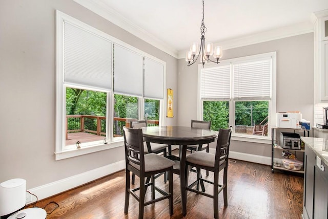2638 Clairmont Rd, Atlanta, GA 30329 - dining space with a chandelier, crown molding, healthy amount of natural light, and dark wood finished floors