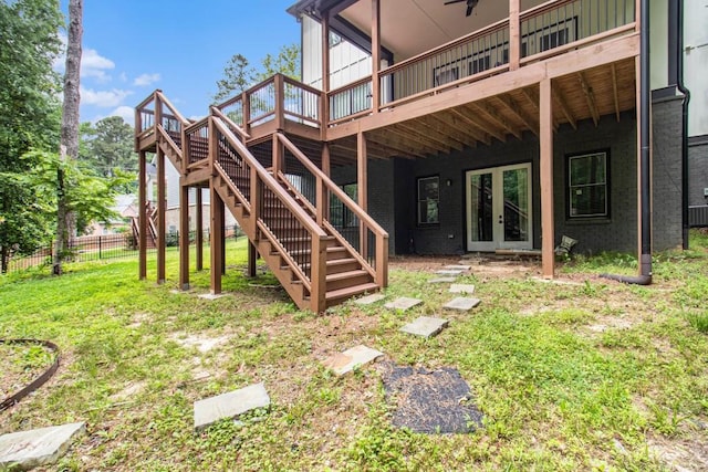 2638 Clairmont Rd, Atlanta, GA 30329 - back of property featuring stairs, a wooden deck, and a yard