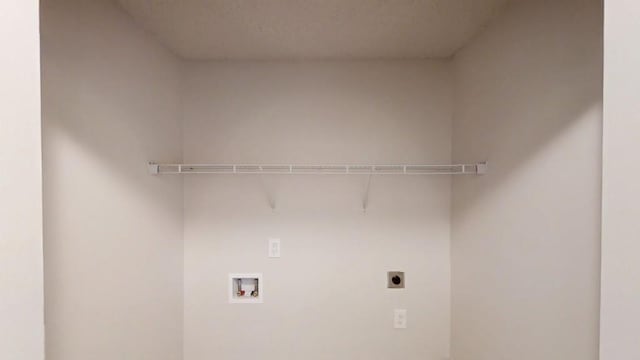 laundry area featuring hookup for a washing machine and hookup for an electric dryer