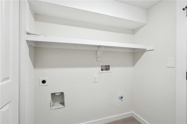 washroom featuring wood-type flooring, hookup for an electric dryer, and washer hookup