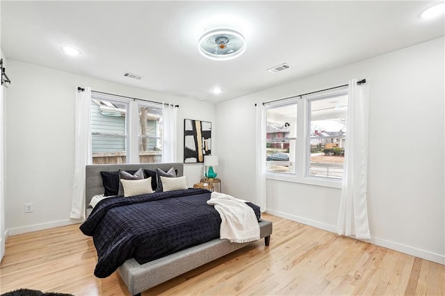 bedroom featuring light hardwood / wood-style floors