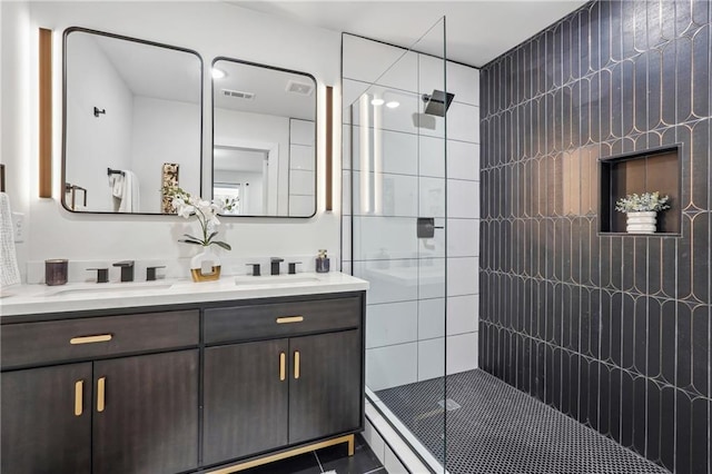 bathroom featuring vanity and walk in shower