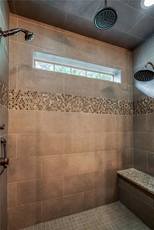 bathroom featuring tiled shower