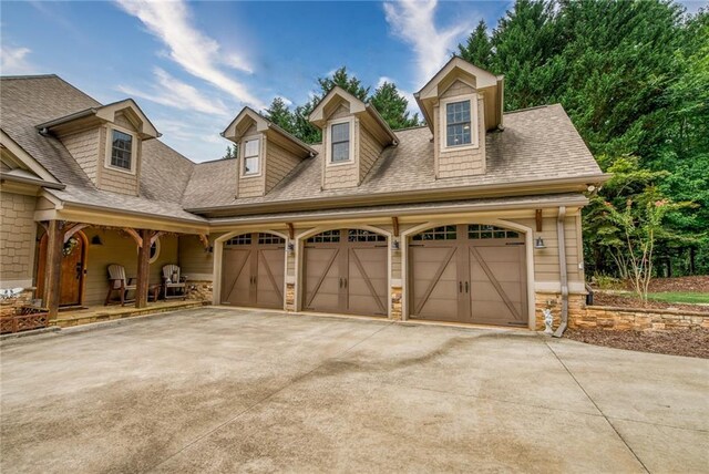 view of front of property featuring a garage