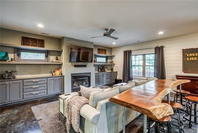 living room featuring ceiling fan