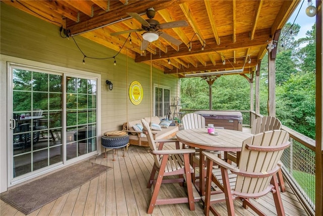 wooden terrace featuring ceiling fan