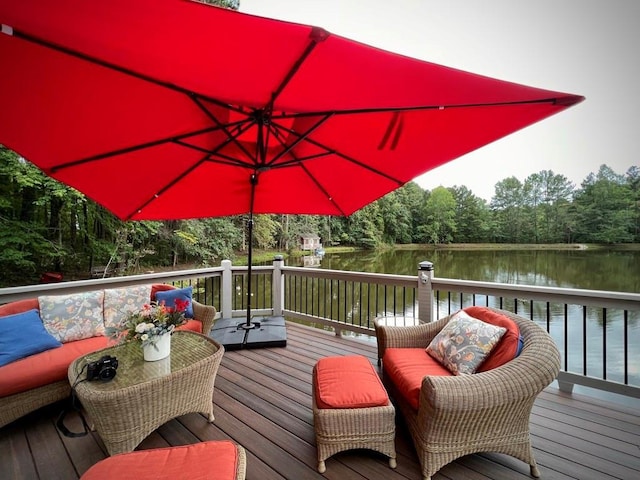 deck featuring a water view