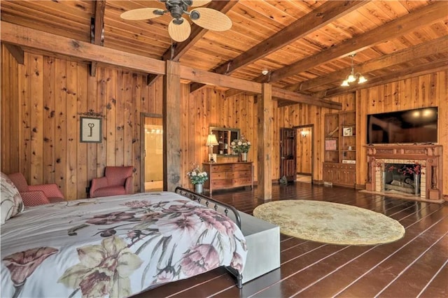 bedroom with beamed ceiling, wood ceiling, wood walls, a notable chandelier, and dark wood-type flooring