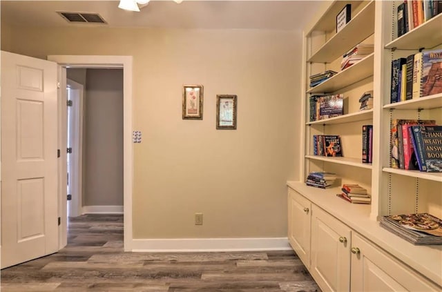 hallway featuring dark hardwood / wood-style floors