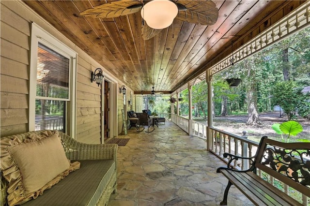 view of patio featuring covered porch and ceiling fan