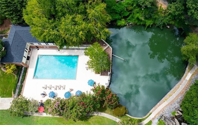 bird's eye view with a water view