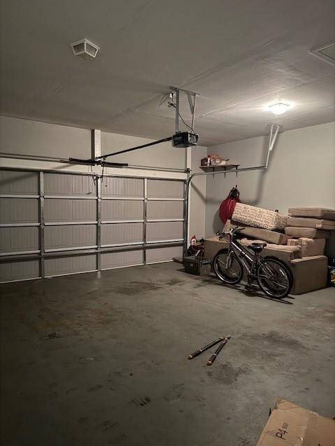 garage with a garage door opener