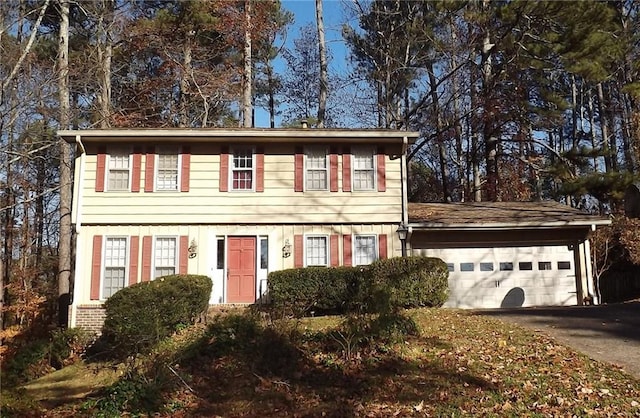 colonial house featuring a garage