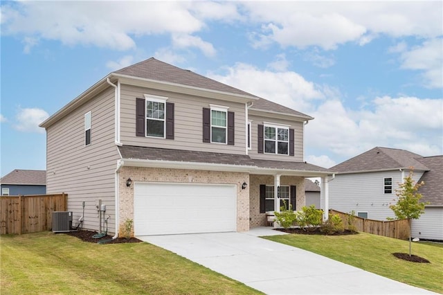 187 Lyndhurst Dr, Bethlehem, GA 30620 - view of front of house featuring central air condition unit, concrete driveway, an attached garage, brick siding, and covered porch