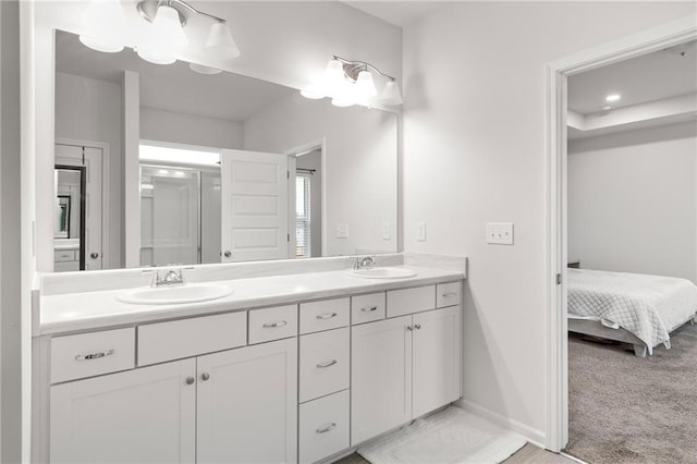 187 Lyndhurst Dr, Bethlehem, GA 30620 - ensuite bathroom featuring double vanity and baseboards