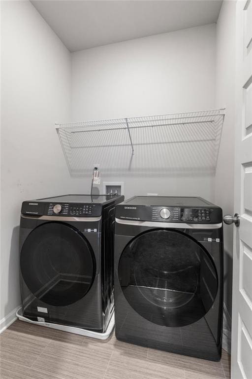 187 Lyndhurst Dr, Bethlehem, GA 30620 - laundry room with independent washer and dryer and baseboards