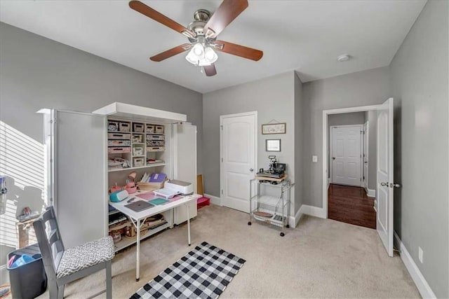 interior space featuring ceiling fan