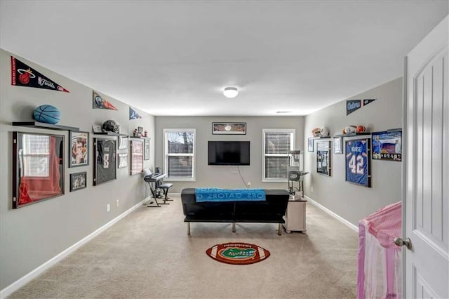 playroom featuring light colored carpet