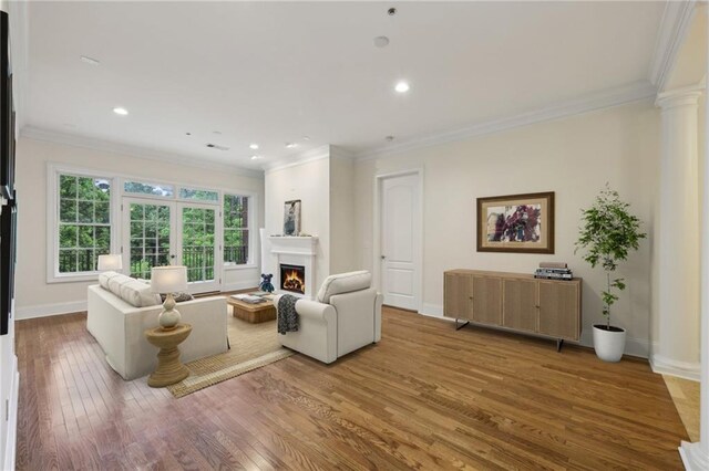 3280 Stillhouse Ln SE Unit 212, Atlanta, GA 30339 - hall featuring ornate columns, ornamental molding, baseboards, and light stone finish flooring