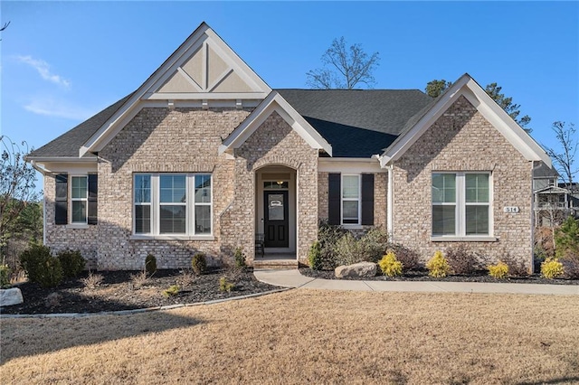 view of front of home with a front yard