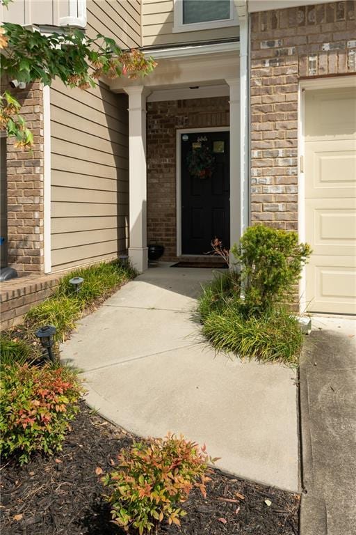 entrance to property with a garage