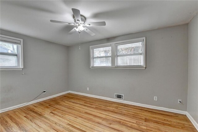 unfurnished bedroom with light wood-type flooring and ceiling fan