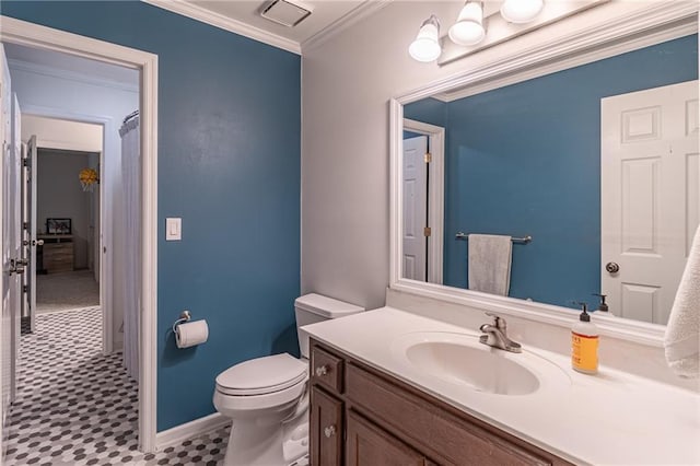 bathroom featuring visible vents, baseboards, vanity, toilet, and ornamental molding