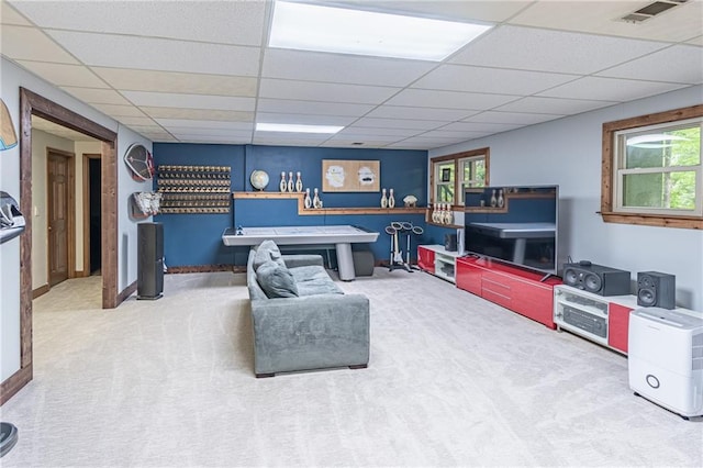 living room with visible vents, a paneled ceiling, and carpet floors