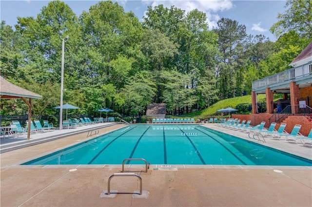 pool with a patio