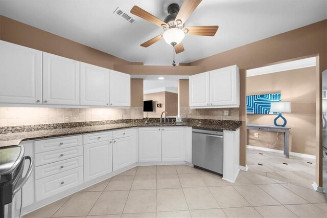 3334 Peachtree Rd NE Unit 608, Atlanta, GA 30326 - kitchen with dishwasher, a sink, range, a ceiling fan, and backsplash