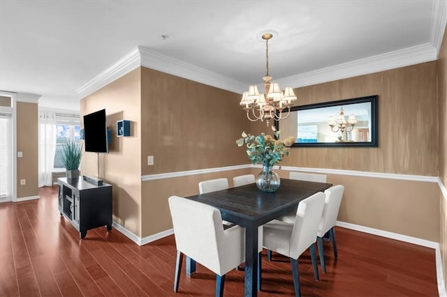3334 Peachtree Rd NE Unit 608, Atlanta, GA 30326 - dining space with a chandelier, baseboards, ornamental molding, and wood finished floors