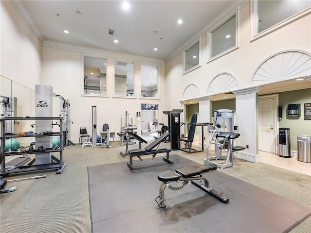 3334 Peachtree Rd NE Unit 608, Atlanta, GA 30326 - gym with crown molding, a towering ceiling, and recessed lighting