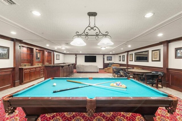 3334 Peachtree Rd NE Unit 608, Atlanta, GA 30326 - recreation room with recessed lighting, pool table, bar with sink, wainscoting, and a decorative wall