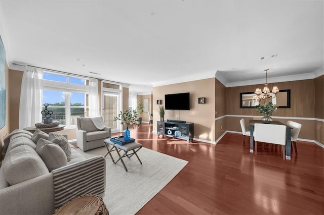 3334 Peachtree Rd NE Unit 608, Atlanta, GA 30326 - living area featuring a chandelier, wood finished floors, baseboards, and ornamental molding