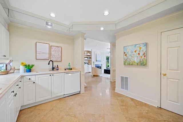 kitchen with white appliances, backsplash, ornamental molding, white cabinets, and ornate columns