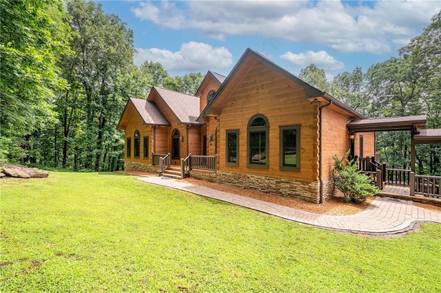 back of property featuring a porch and a yard