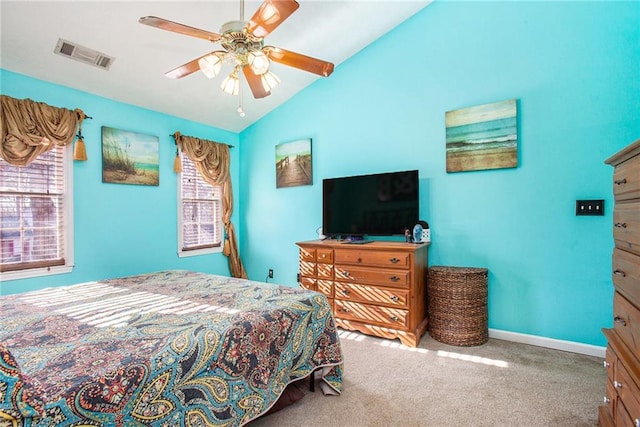 carpeted bedroom featuring lofted ceiling and ceiling fan