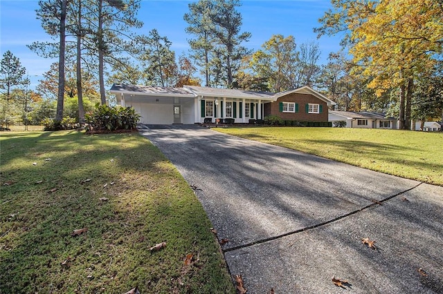 single story home featuring a front yard and a carport