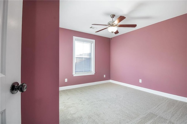 empty room with carpet and ceiling fan