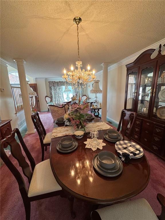 2246 Carrington Dr, Ellenwood, GA 30294 - dining area with ornamental molding, carpet flooring, a textured ceiling, and ornate columns