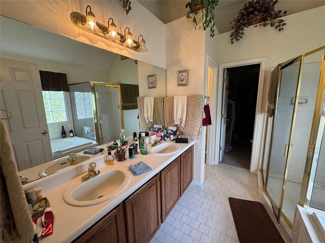 2246 Carrington Dr, Ellenwood, GA 30294 - full bath with tile patterned floors, a sink, and a stall shower