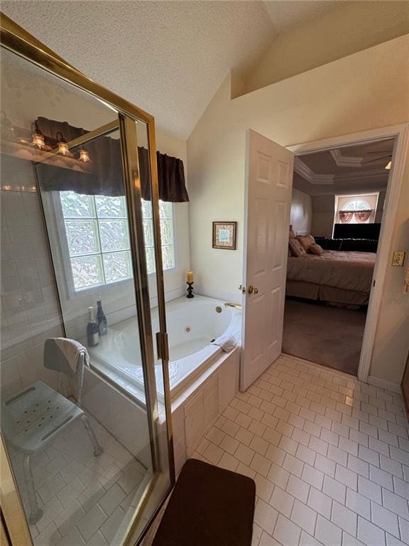 2246 Carrington Dr, Ellenwood, GA 30294 - ensuite bathroom with ensuite bath, vaulted ceiling, a tub with jets, and a stall shower