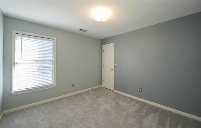 view of carpeted spare room