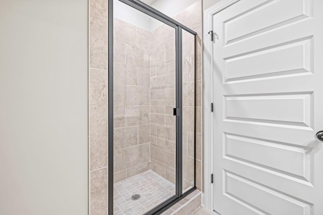 full bathroom featuring a stall shower