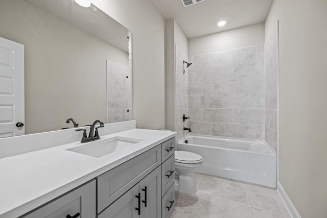 full bath with visible vents, toilet, tub / shower combination, baseboards, and vanity