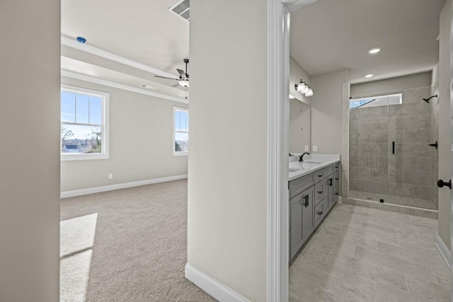 full bath with vanity, a shower stall, recessed lighting, and baseboards