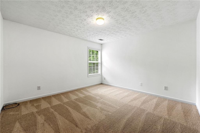 8770 Amberfield Dr, Gainesville, GA 30506 - carpeted empty room with baseboards and a textured ceiling