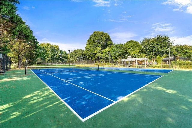 8770 Amberfield Dr, Gainesville, GA 30506 - view of tennis court featuring view of scattered trees